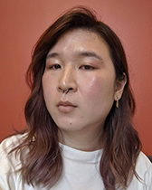e.-zhang-headshot-cropped-2.jpg